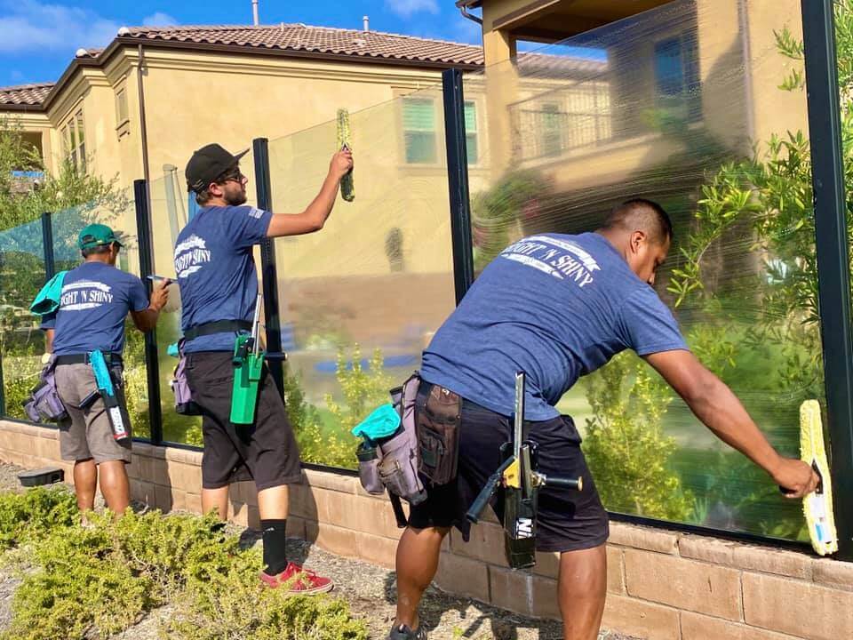 Bright N Shiny crew members cleaning exterior glass at a Mission Viejo home